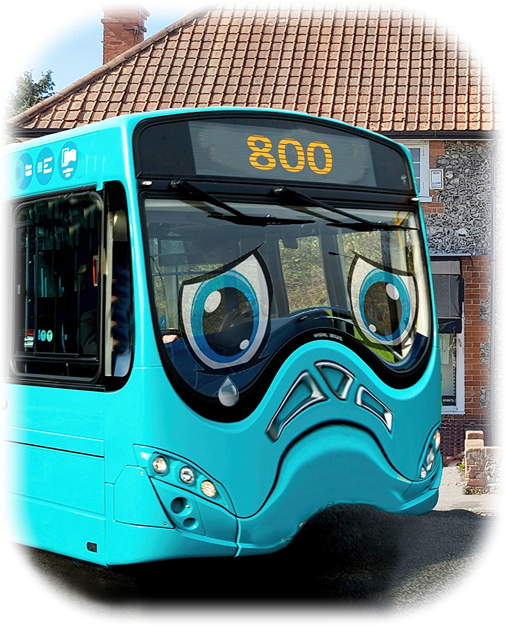 Image of a bus with a sad face sticker on the front